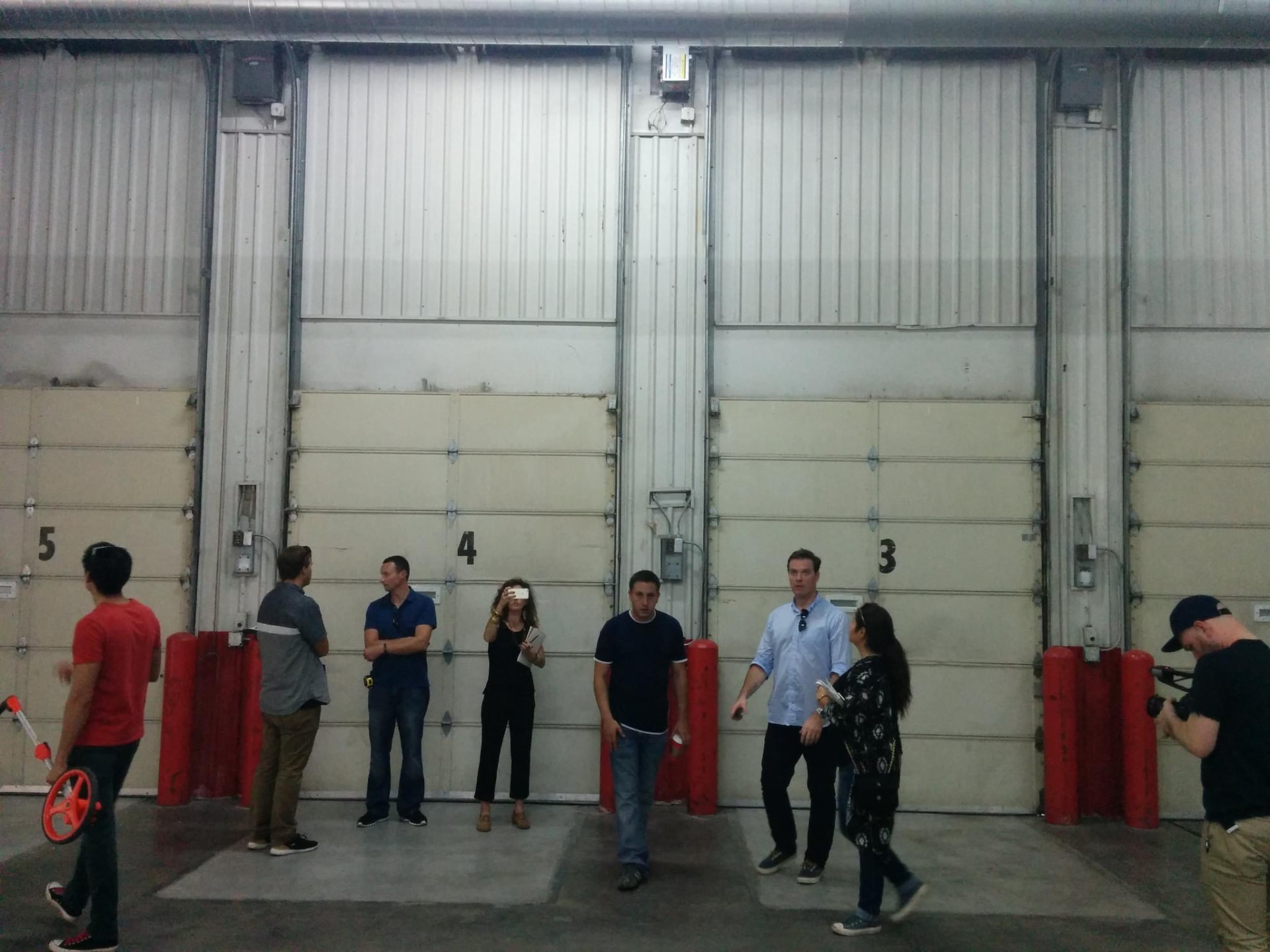 Numbered loading bays at Silver Street Studios during the exploratory Day for Night 2015 site visit.