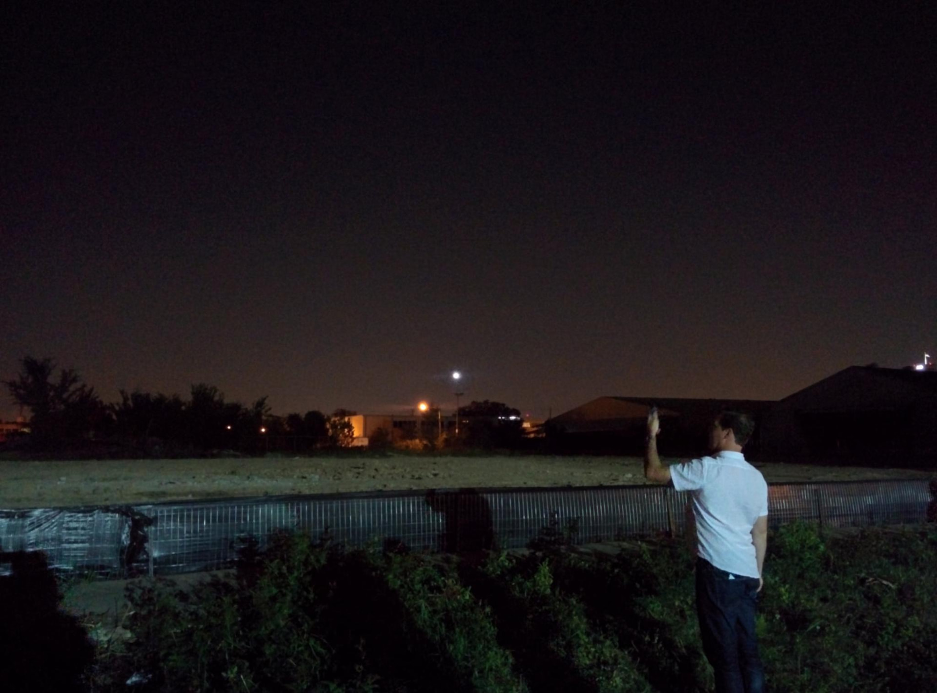 Night view from Silver Street Studios across an undeveloped area during the exploratory Day for Night 2015 site visit.